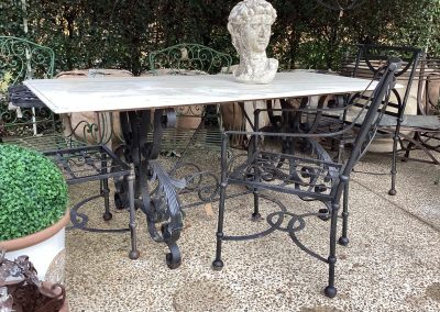 Marble Table with Iron Chairs Table $2495  Chairs $295